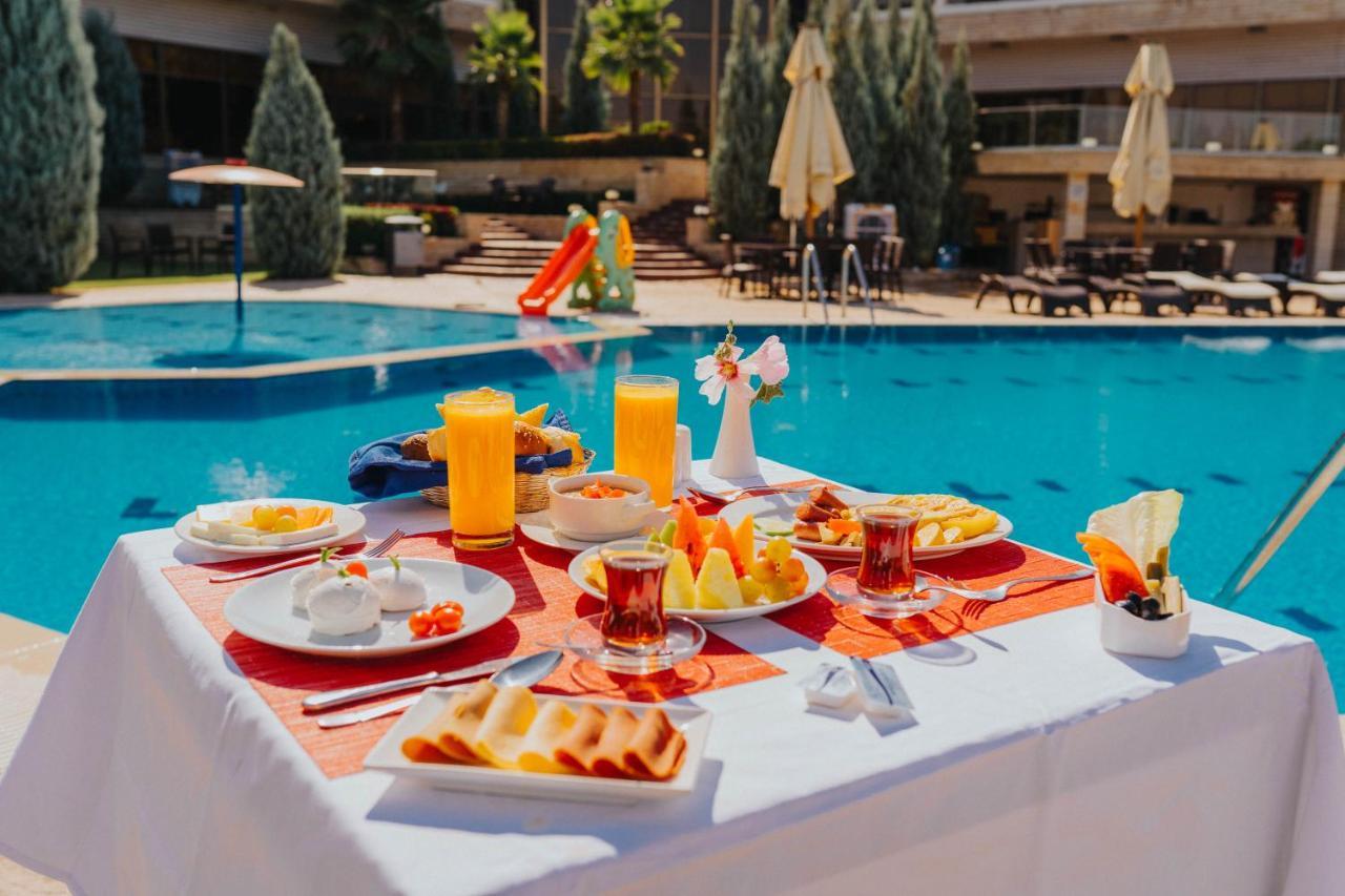 Ashur Hotel Dukhan Bagian luar foto