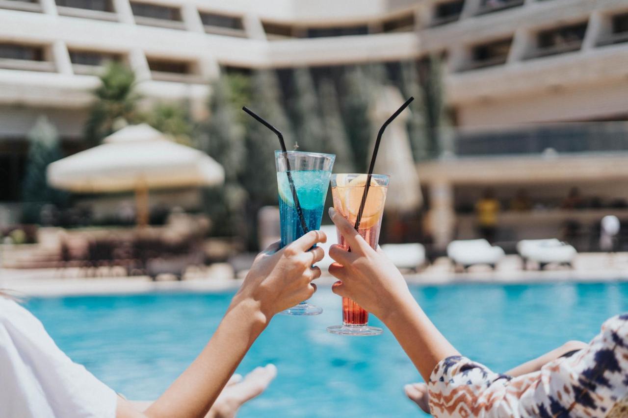 Ashur Hotel Dukhan Bagian luar foto